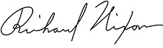 Black cursive signature on white background Black cursive signature on white background