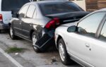 Mid City West, CA – Two-Vehicle Crash Blocks Traffic at Burton Way & S Holt Ave